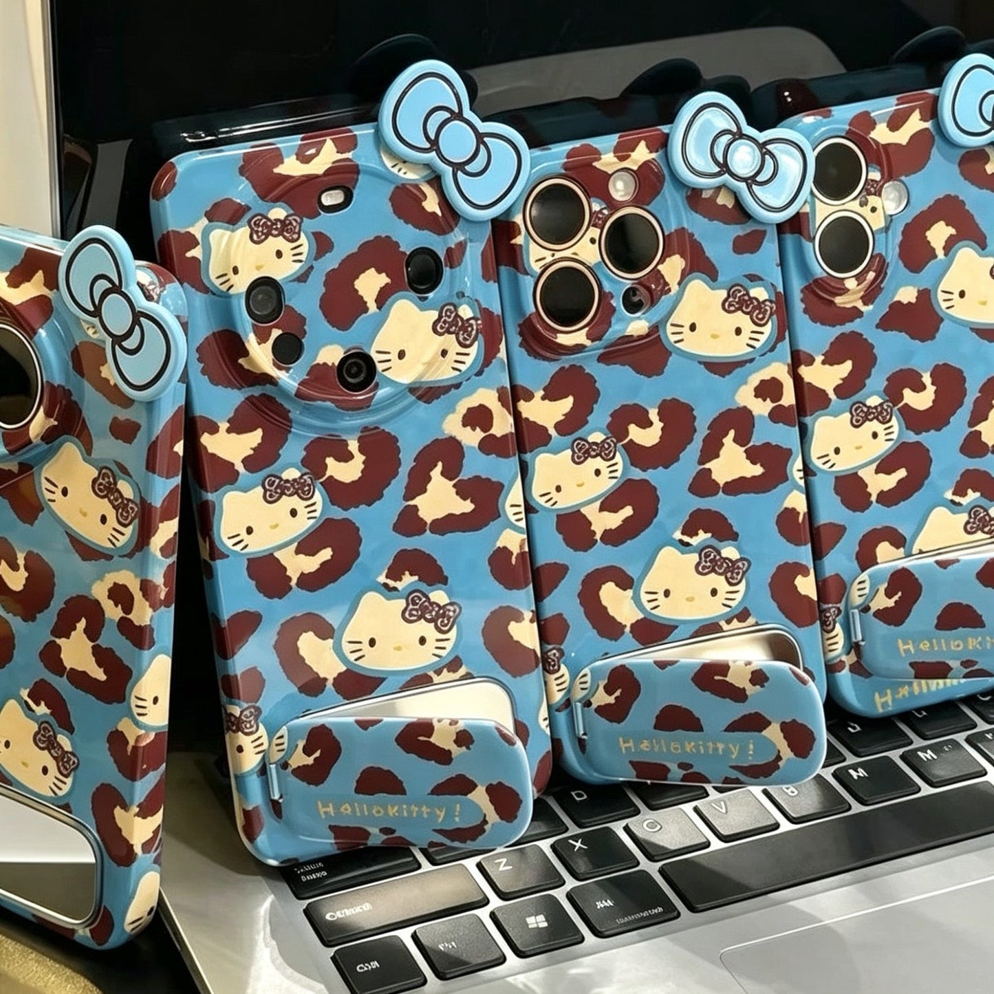 Blue-background leopard print Hello Kitty mirror stand phone case