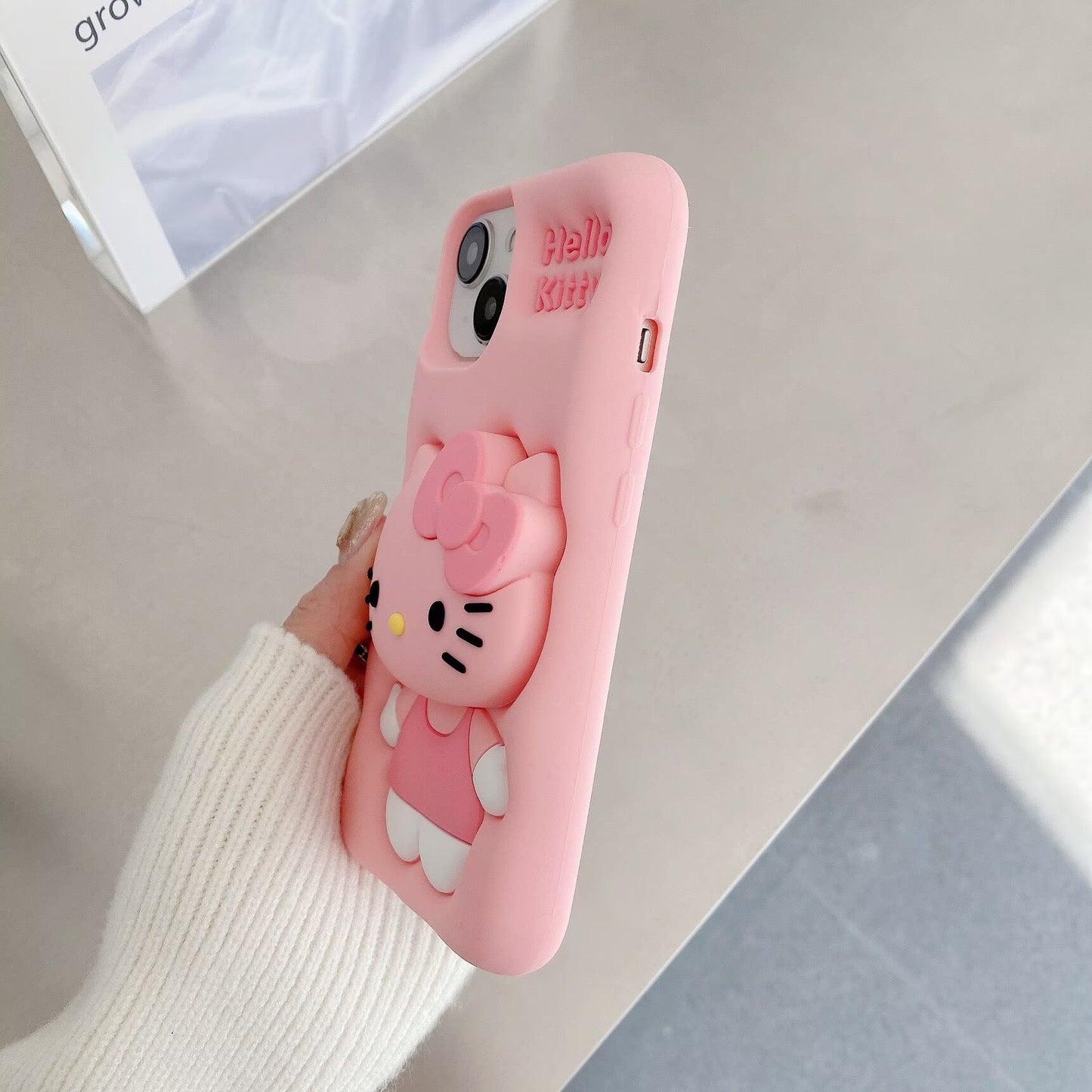 Pink Hello Kitty phone case with stand