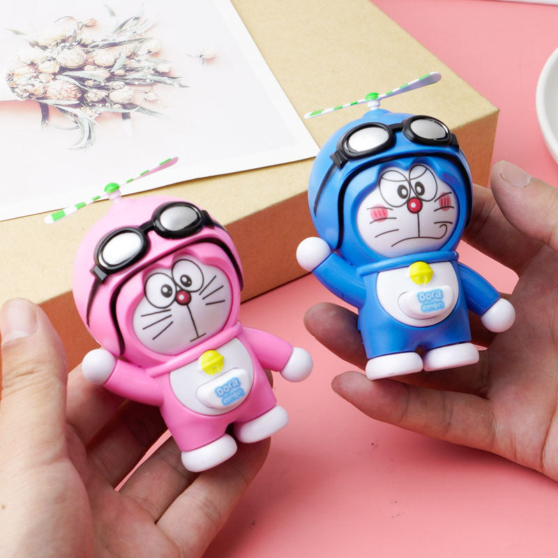 Doraemon press to change face doll pendant
