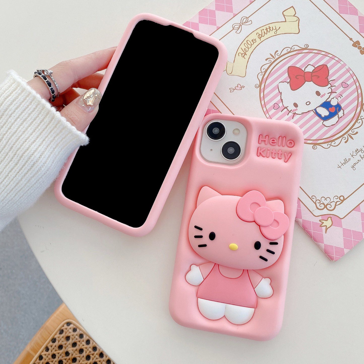Pink Hello Kitty phone case with stand