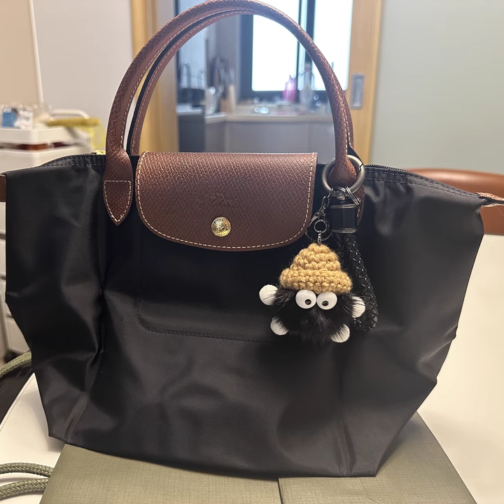 Small coal briquettes bag pendant