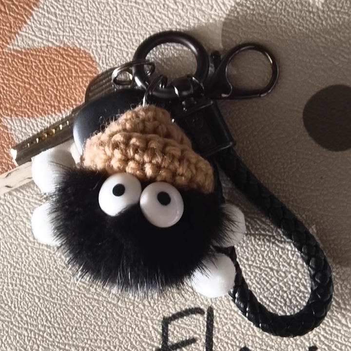 Small coal briquettes bag pendant