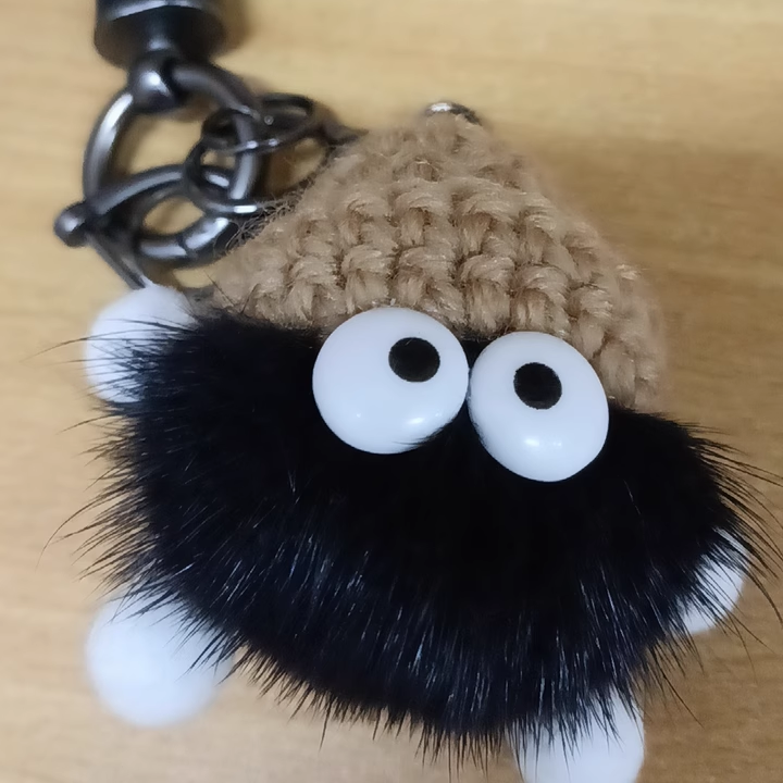 Small coal briquettes bag pendant