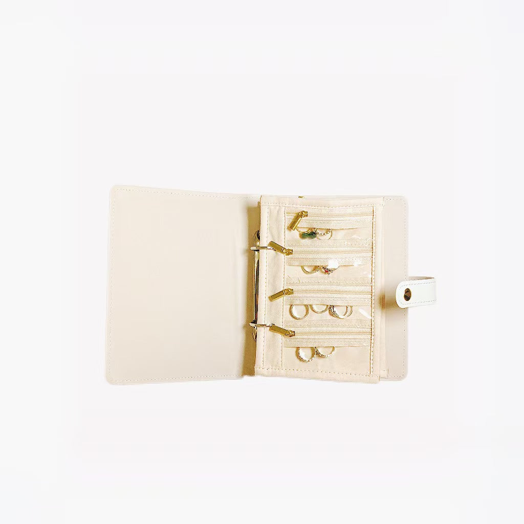 Portable jewelry storage book