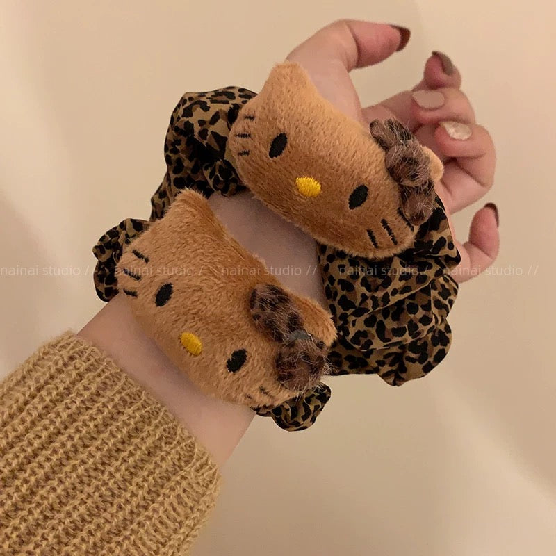 Leopard-print Hello Kitty scrunchie hair accessory