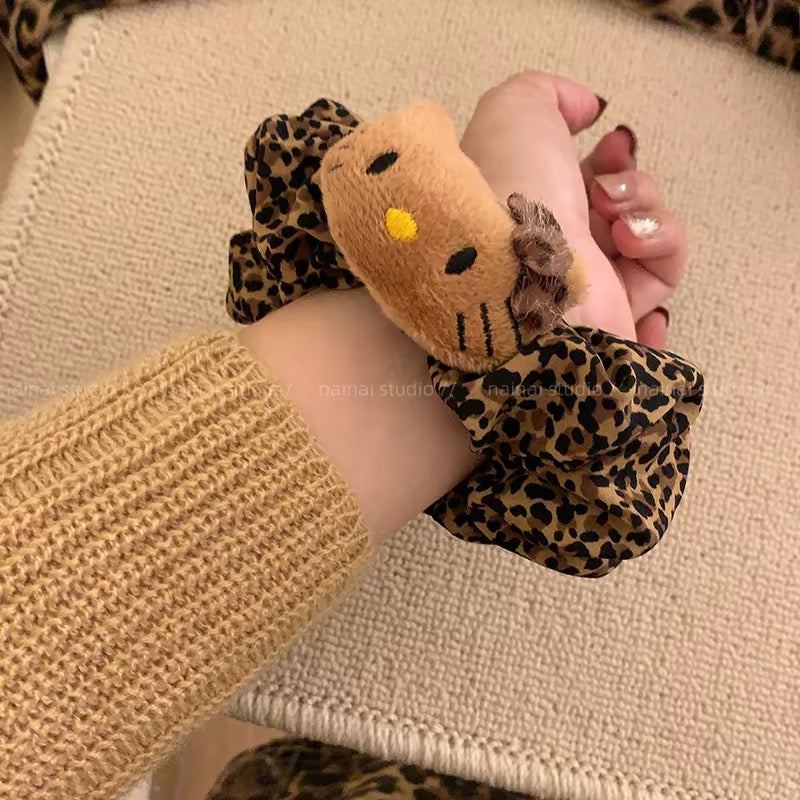Leopard-print Hello Kitty scrunchie hair accessory