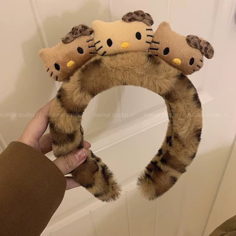 Leopard-print Hello Kitty scrunchie hair accessory