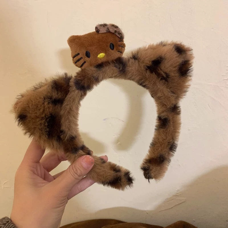 Leopard-print Hello Kitty scrunchie hair accessory