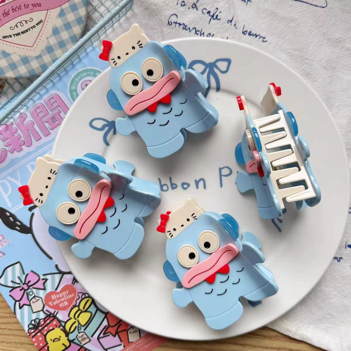 Hello Kitty, Clownfish, and My Melody hair clips