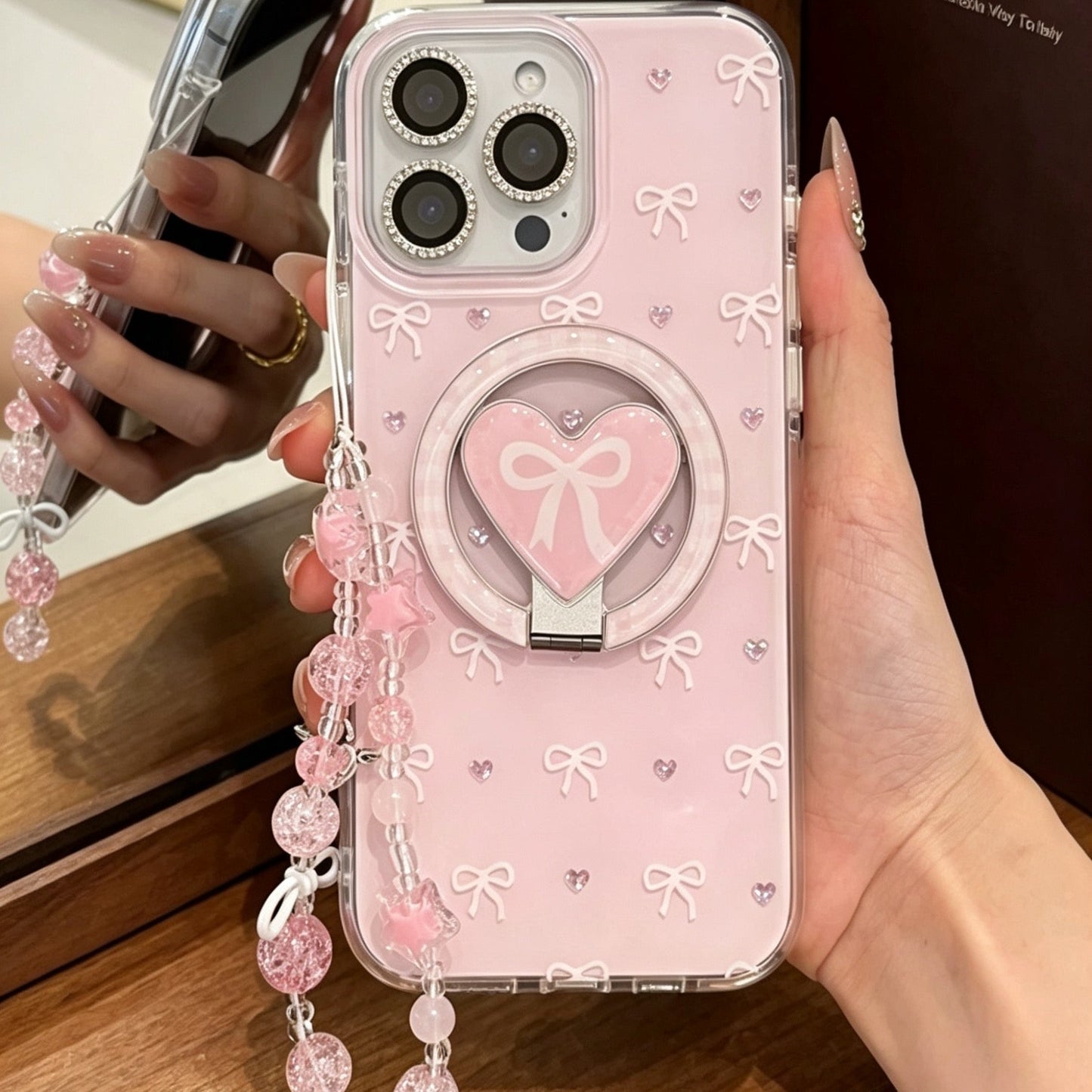 Screen-filling pink diamond hearts and bows + foldable stand + wrist strap