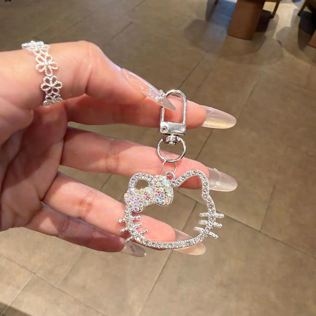 Chic, high-end style Hello Kitty beaded phone charm