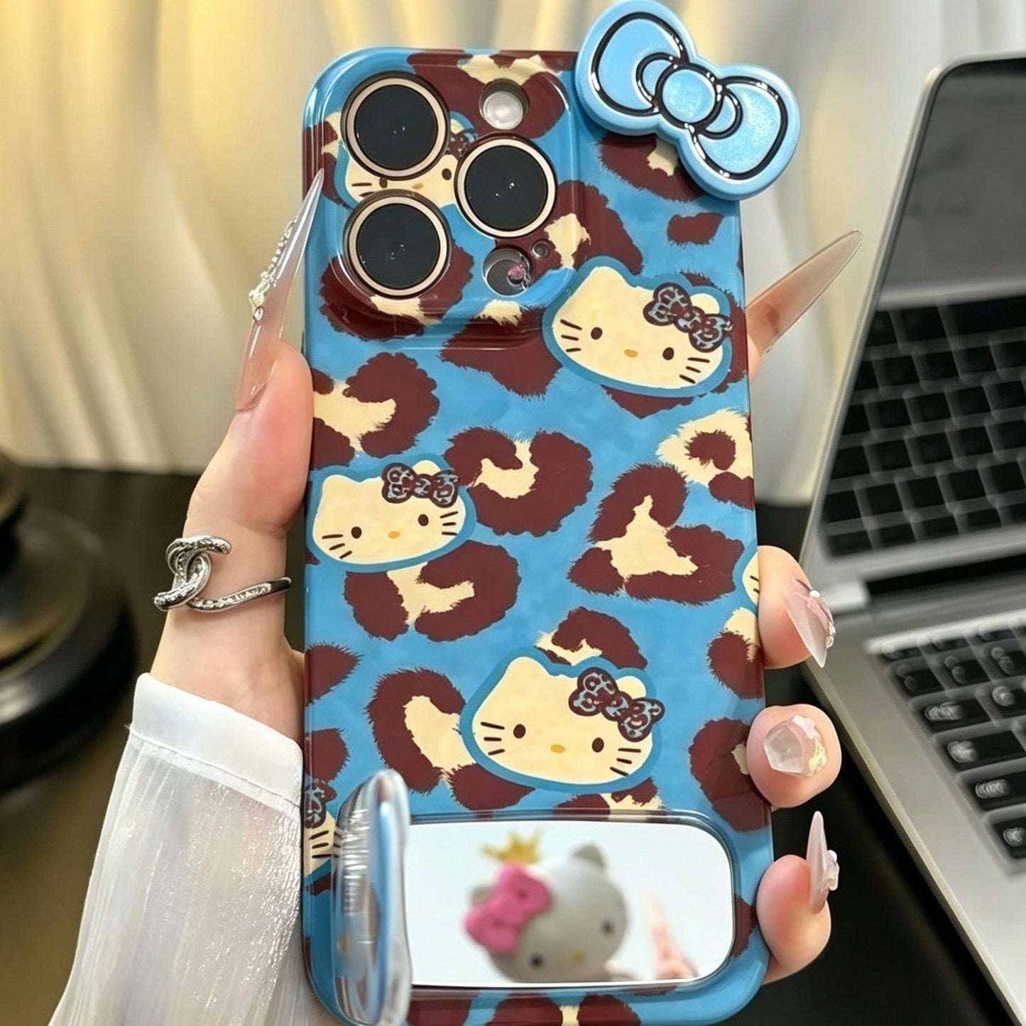 Blue-background leopard print Hello Kitty mirror stand phone case