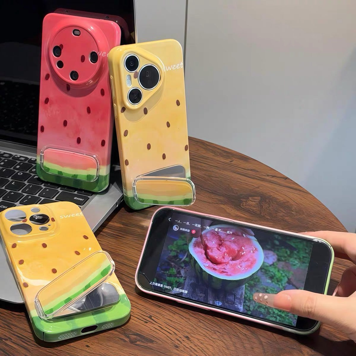 Watermelon-themed phone case with mirror and kickstand
