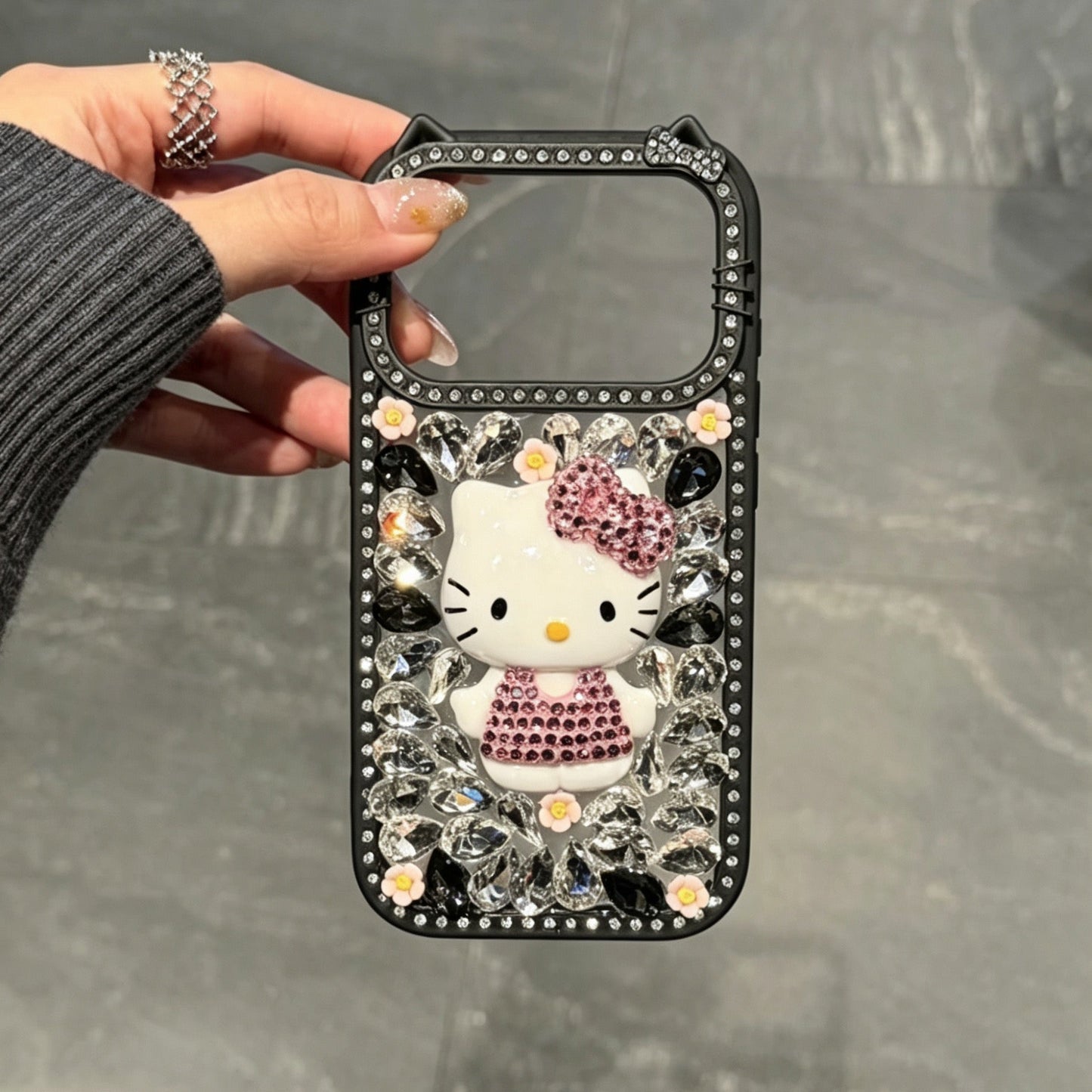 Cute rhinestone-studded Hello Kitty phone case (Instagram style)