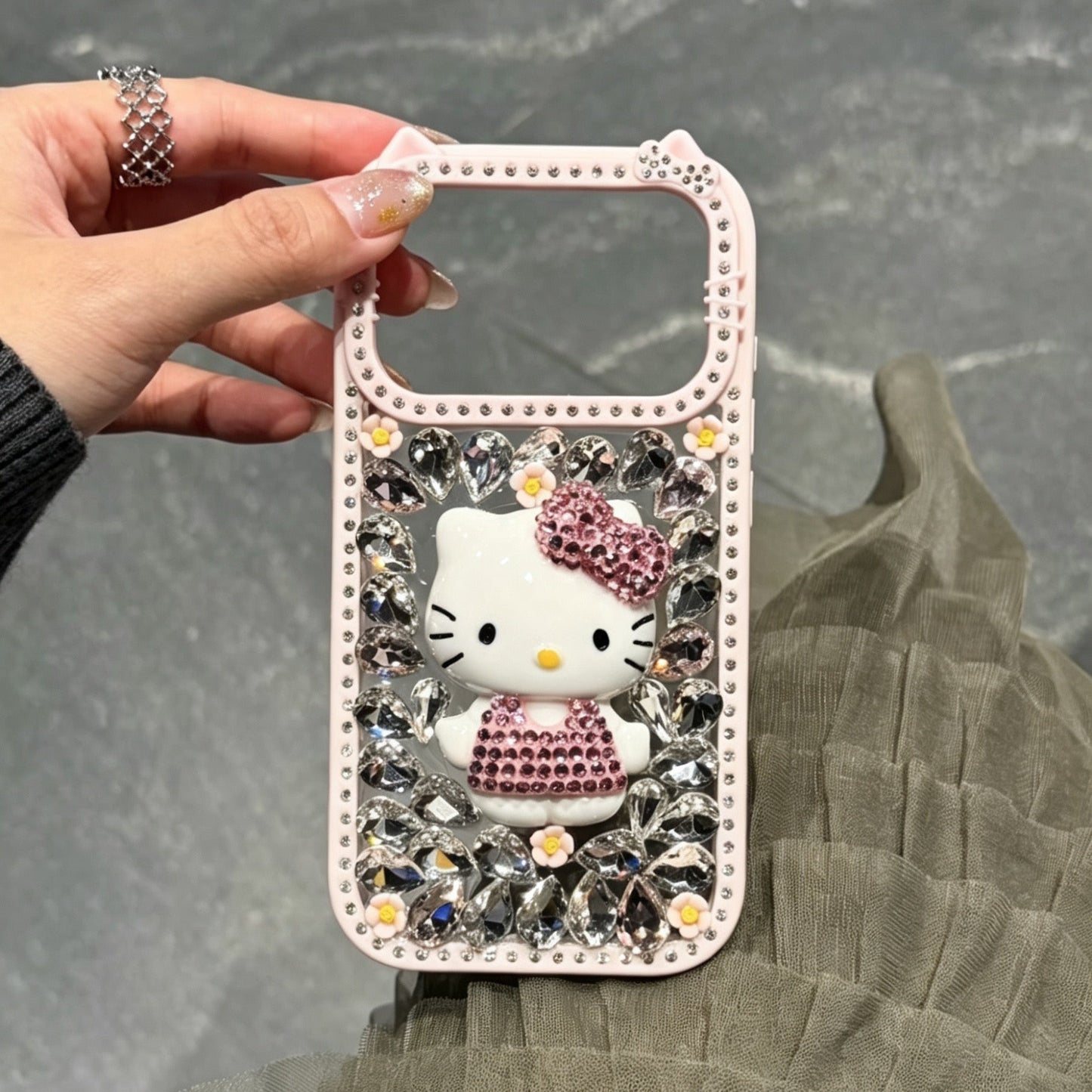 Cute rhinestone-studded Hello Kitty phone case (Instagram style)