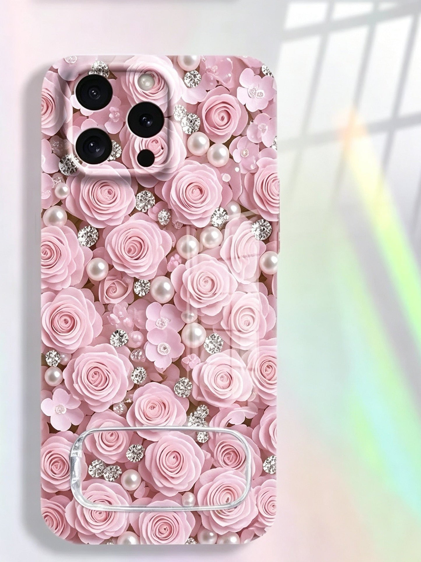 Phone case with a mirror stand, featuring an all-over design of pink rose-shaped beads.