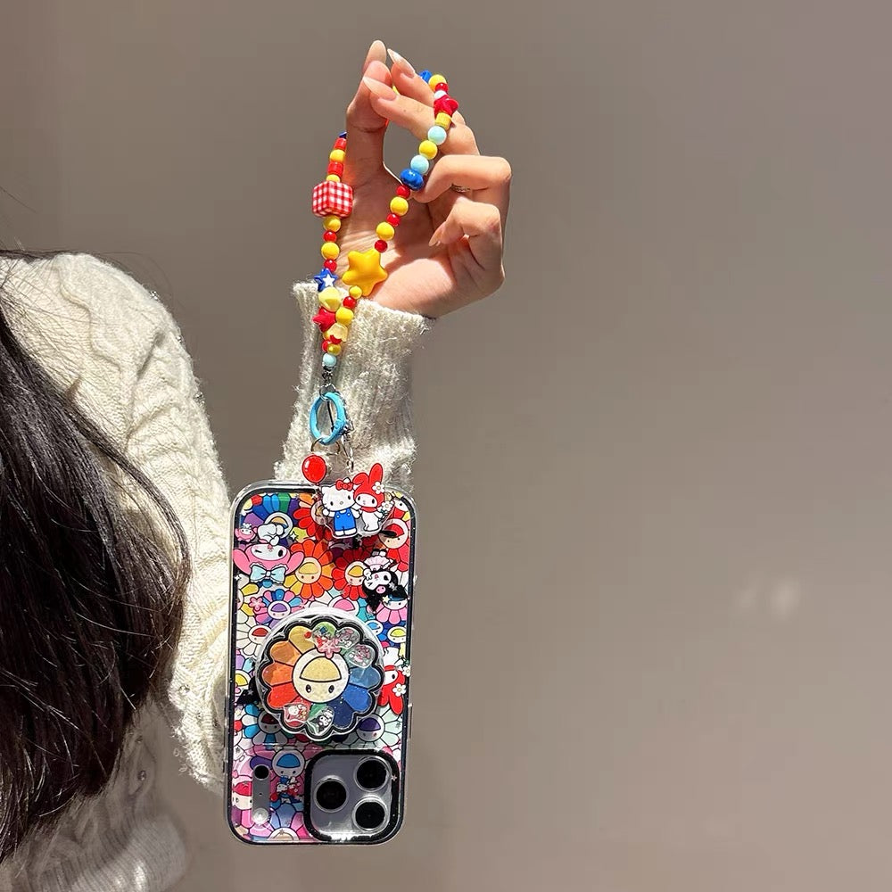 2-in-1 Sanrio-themed magnetic sta2-in-1 Sanrio-themed magnetic stand phone case with a colorful sunflower shaker charm.nd phone case with a colorful sunflower shaker charm.