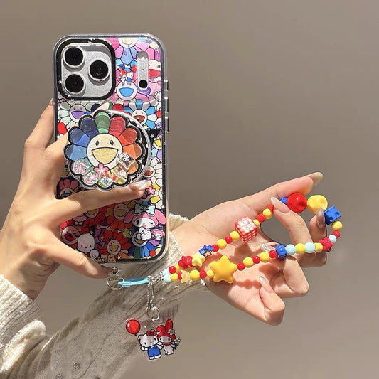 2-in-1 Sanrio-themed magnetic sta2-in-1 Sanrio-themed magnetic stand phone case with a colorful sunflower shaker charm.nd phone case with a colorful sunflower shaker charm.