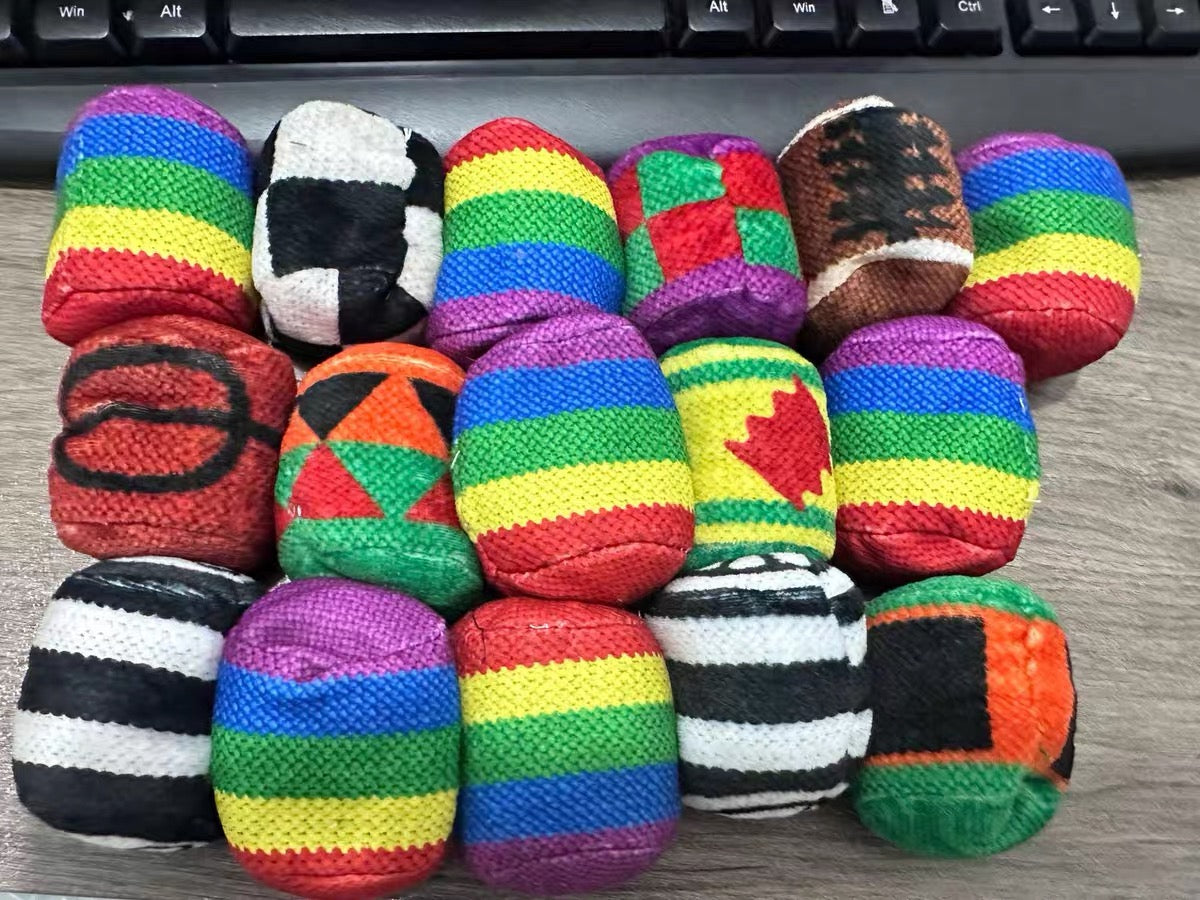 Set of assorted hand-woven beanbags filled with pellets
