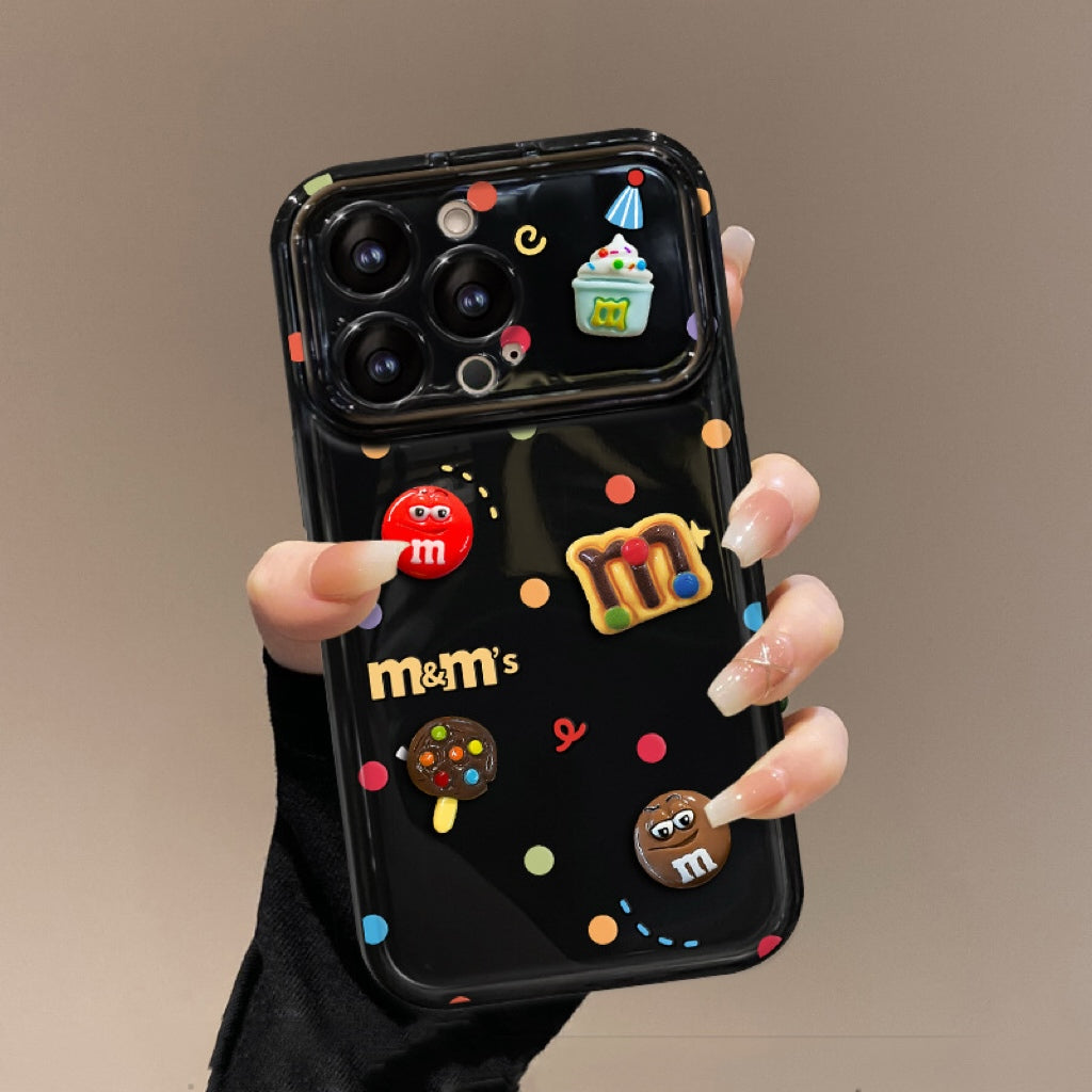 Polka-dot M&M character phone case with a flip-out mirror and wrist strap.