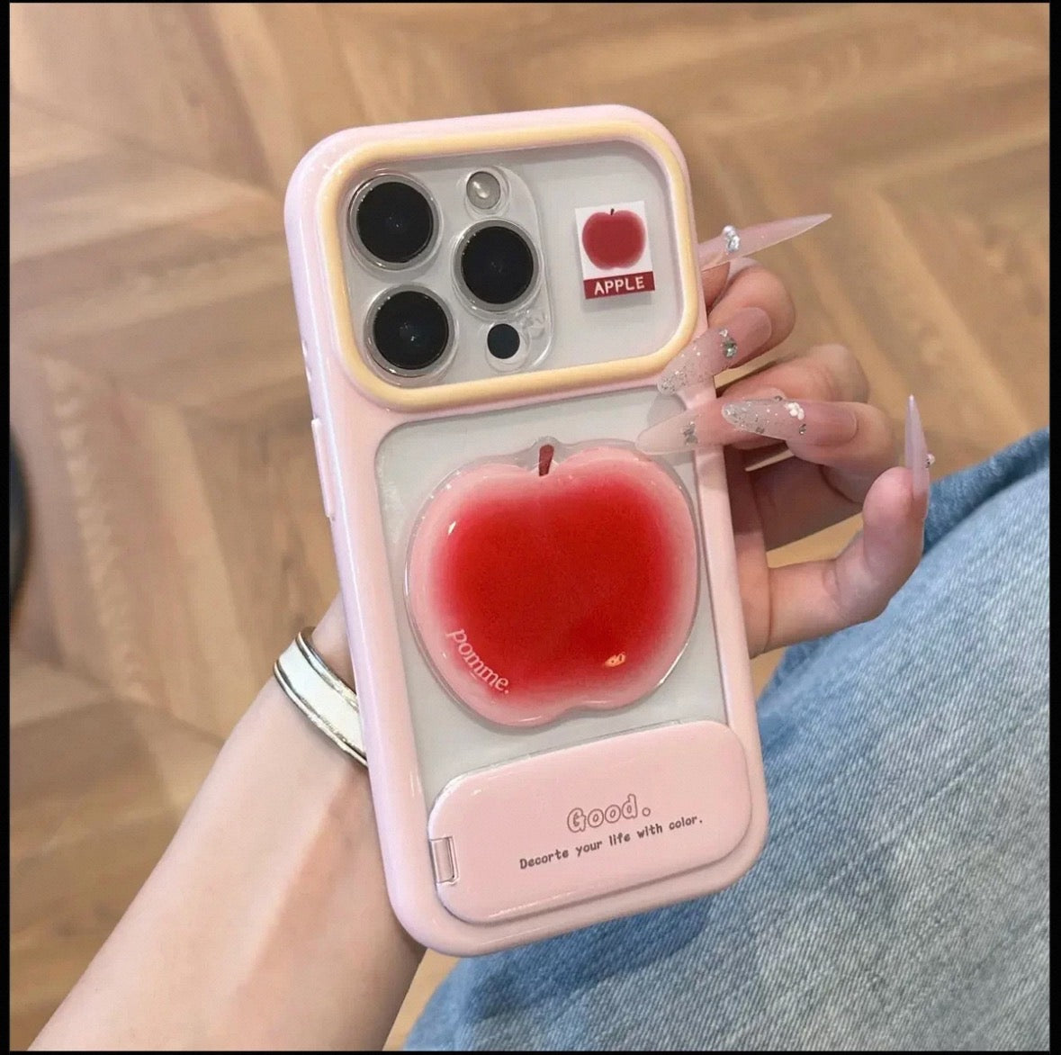 Phone case with a mirror stand and 3D fruit embellishments