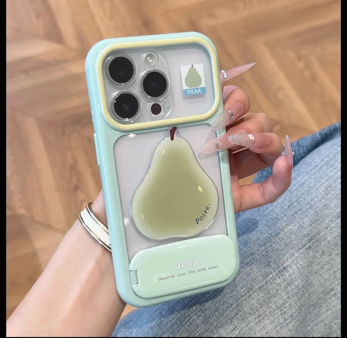 Phone case with a mirror stand and 3D fruit embellishments