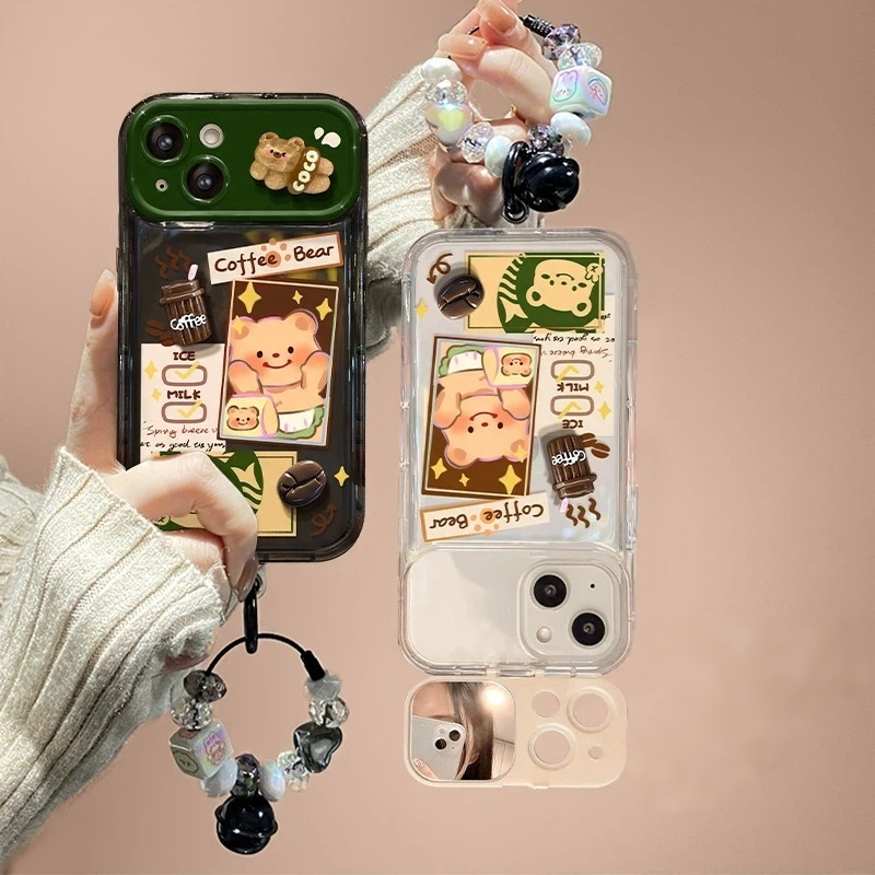 Phone case with a flip-out mirror and a Butter Bear plush charm.