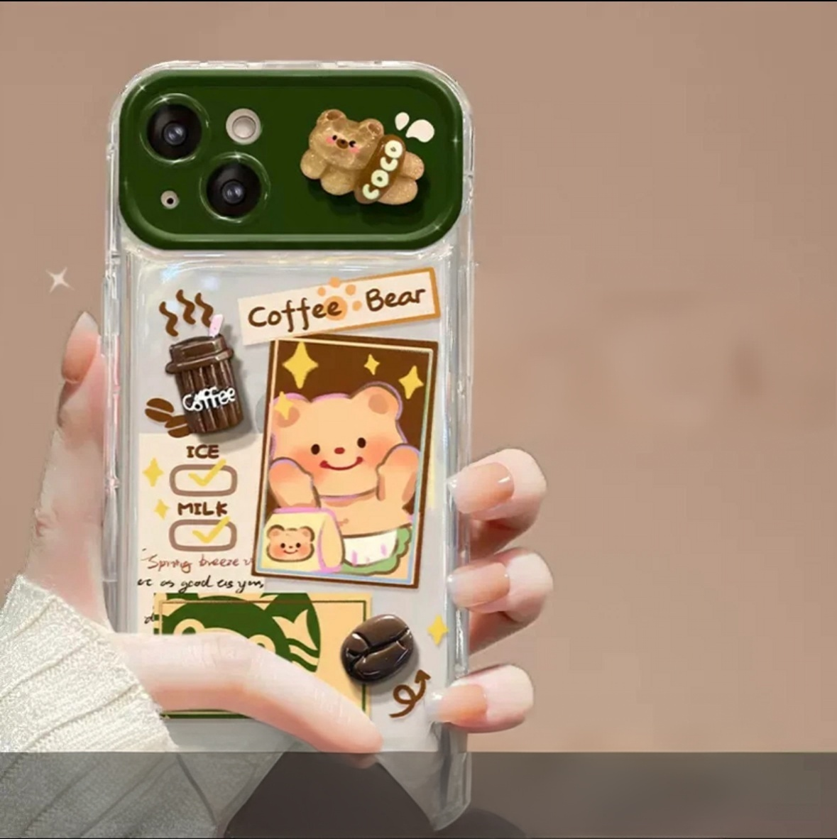 Phone case with a flip-out mirror and a Butter Bear plush charm.