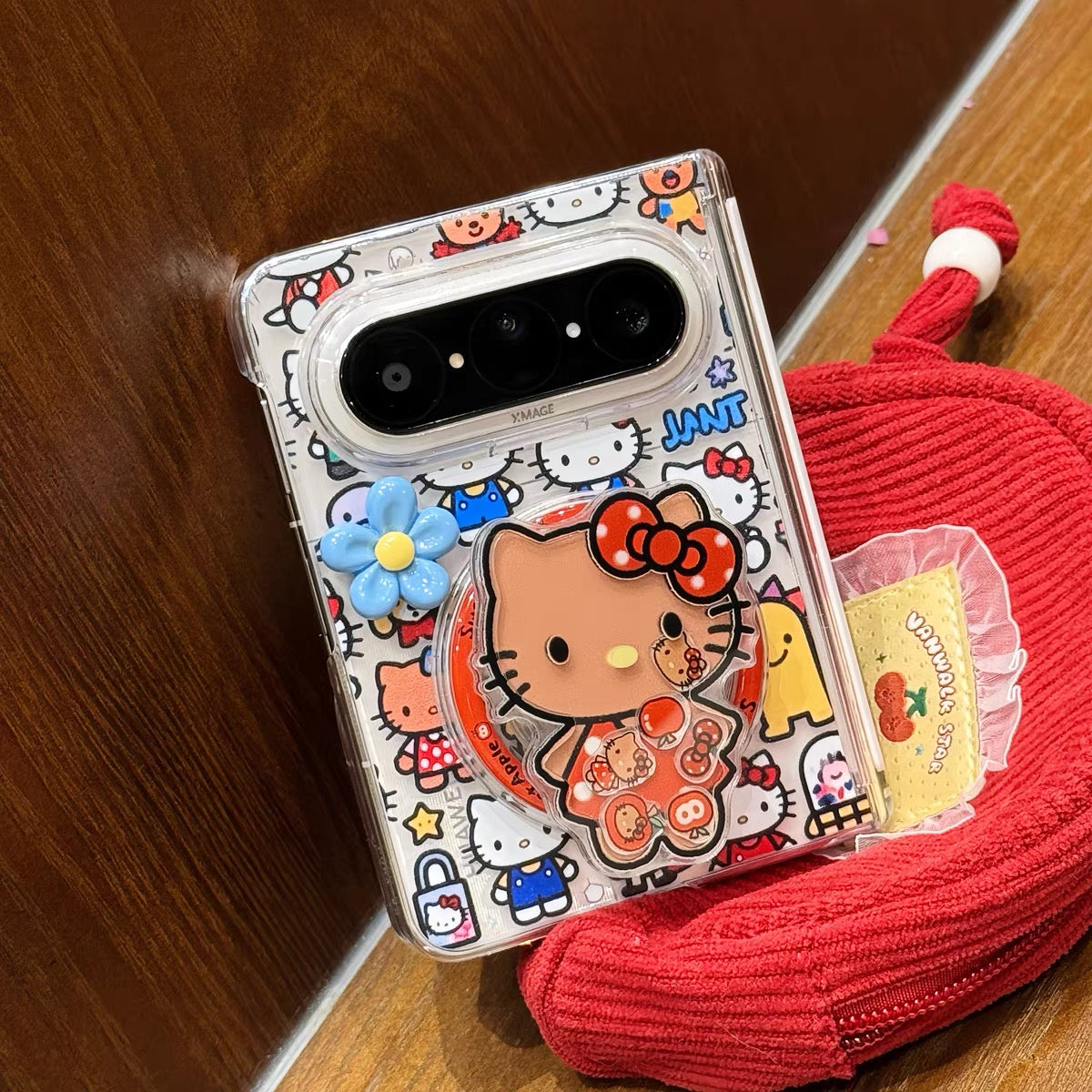 Full-screen Hello Kitty magnetic foldable phone case with a shaker element.