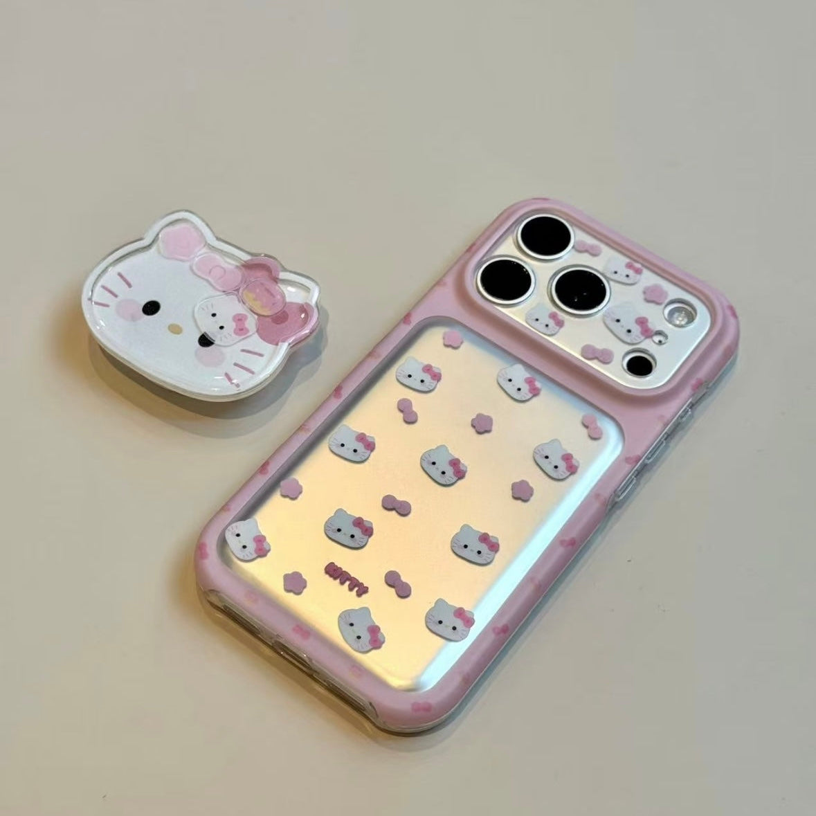 Sweet, girly-style phone case featuring pink flowers, a bow, and a cat head.