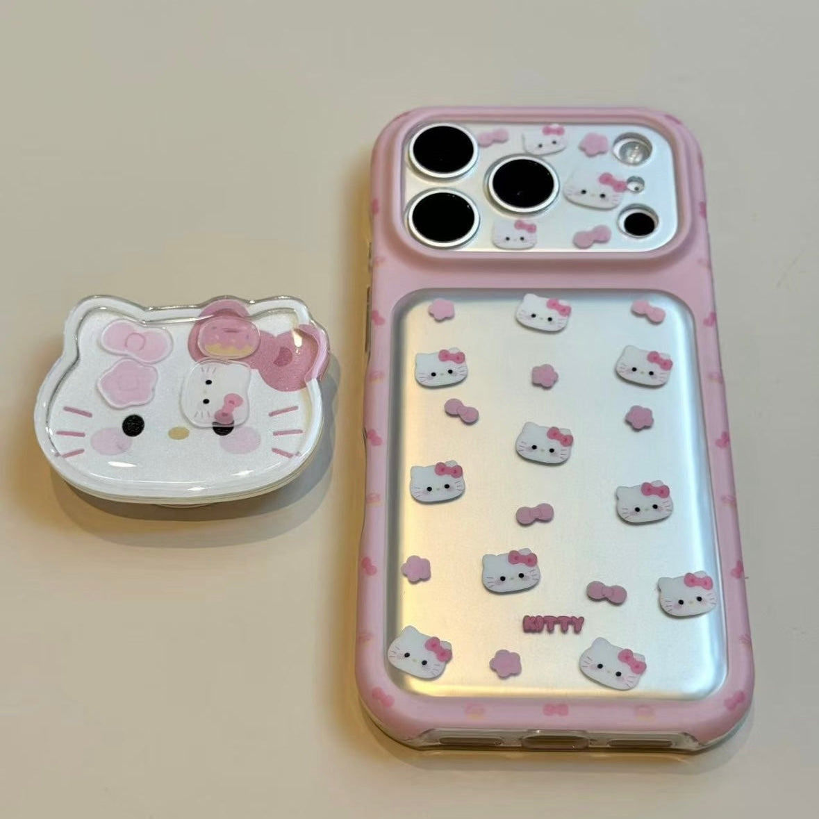 Sweet, girly-style phone case featuring pink flowers, a bow, and a cat head.