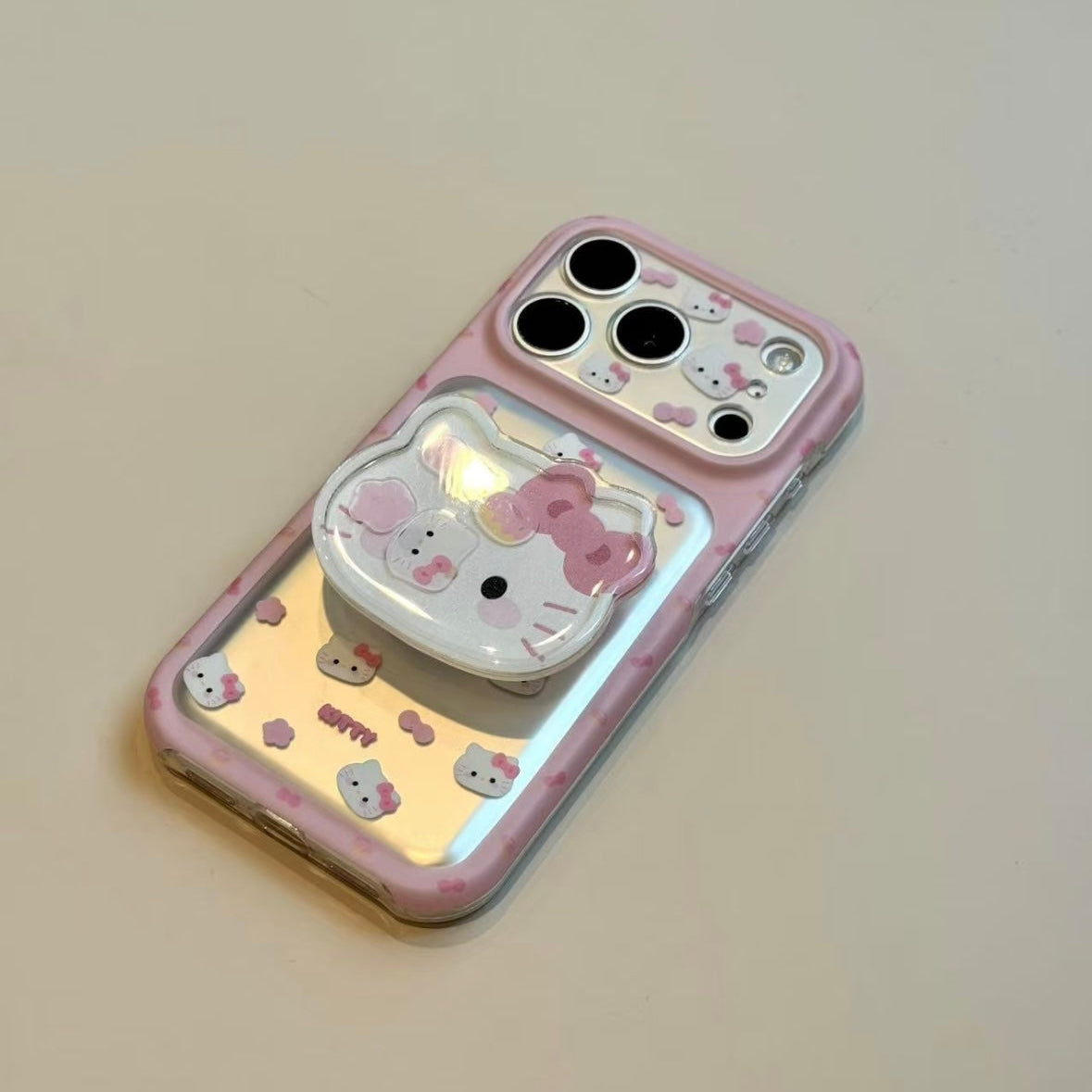 Sweet, girly-style phone case featuring pink flowers, a bow, and a cat head.