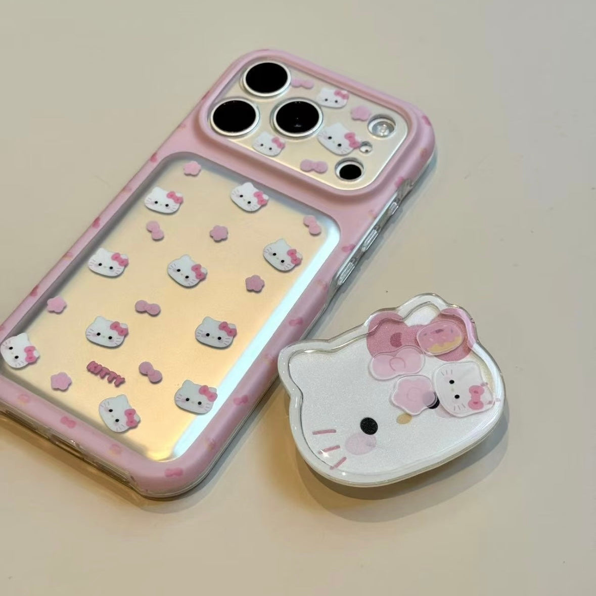 Sweet, girly-style phone case featuring pink flowers, a bow, and a cat head.