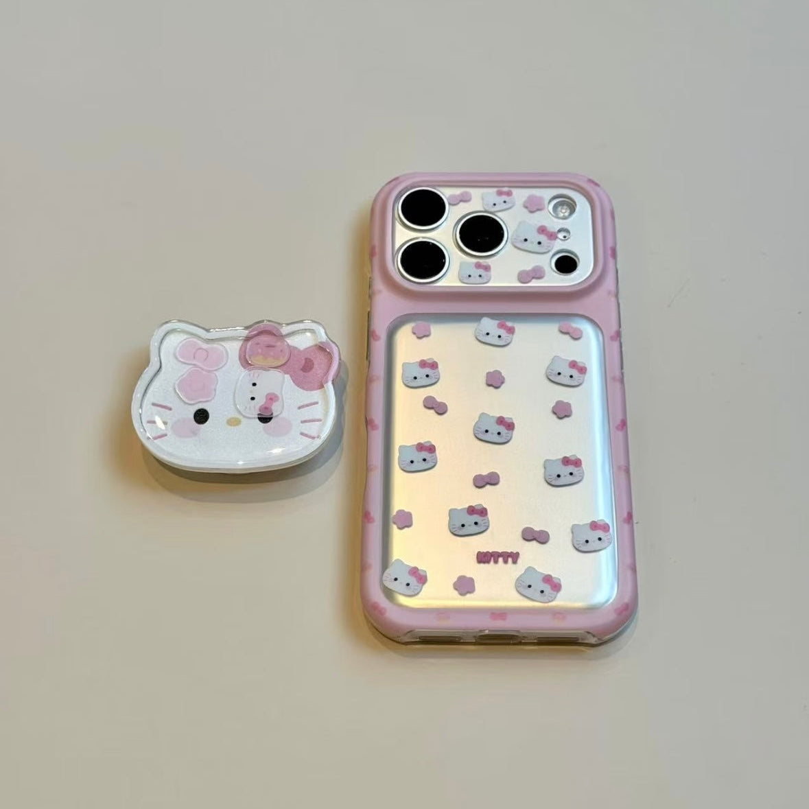 Sweet, girly-style phone case featuring pink flowers, a bow, and a cat head.
