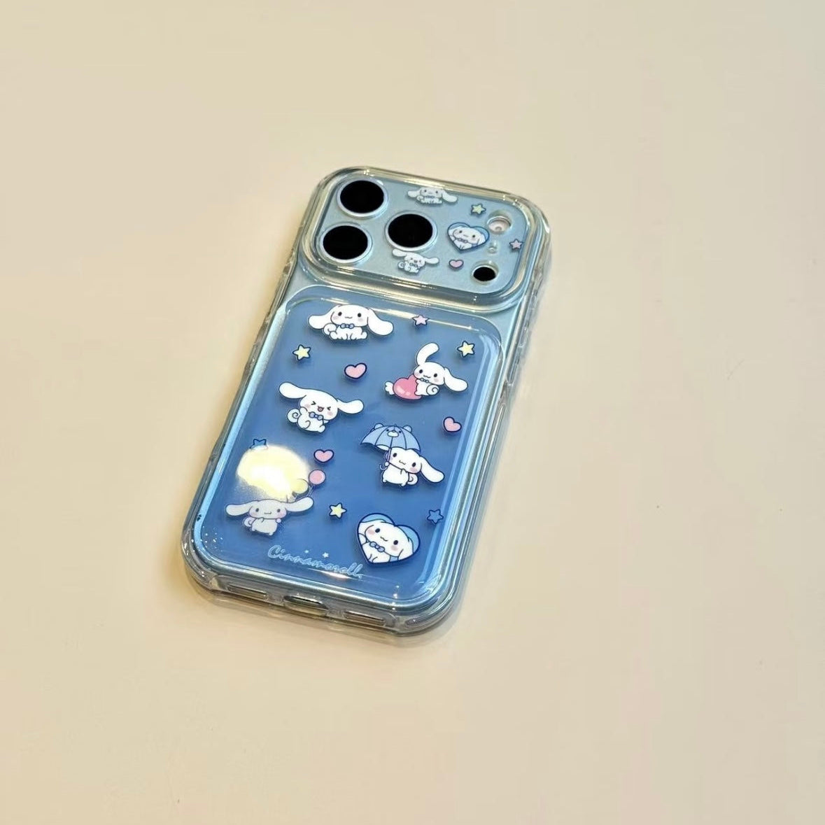 Cinnamoroll phone case featuring a gradient transparent balloon and an umbrella design.