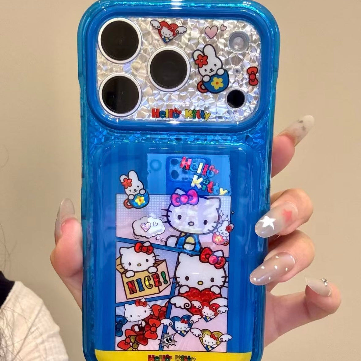 Cartoon Hello Kitty phone case featuring a bow, wings, and a red heart.