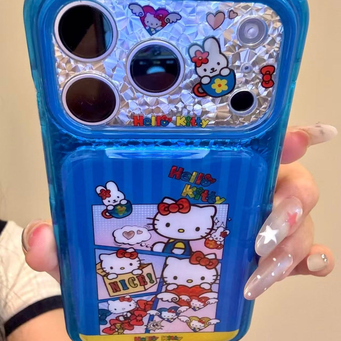 Cartoon Hello Kitty phone case featuring a bow, wings, and a red heart.