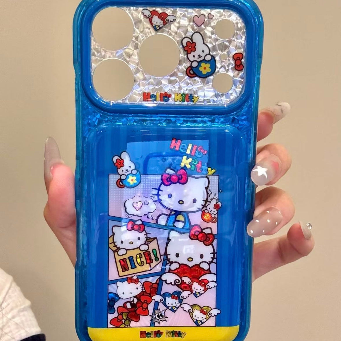 Cartoon Hello Kitty phone case featuring a bow, wings, and a red heart.