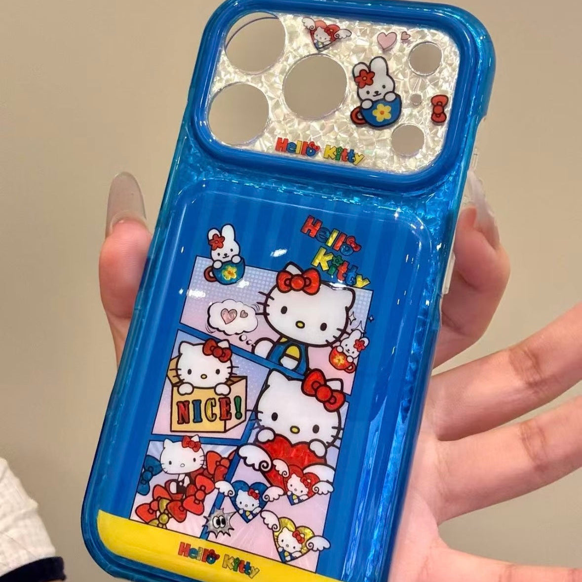 Cartoon Hello Kitty phone case featuring a bow, wings, and a red heart.