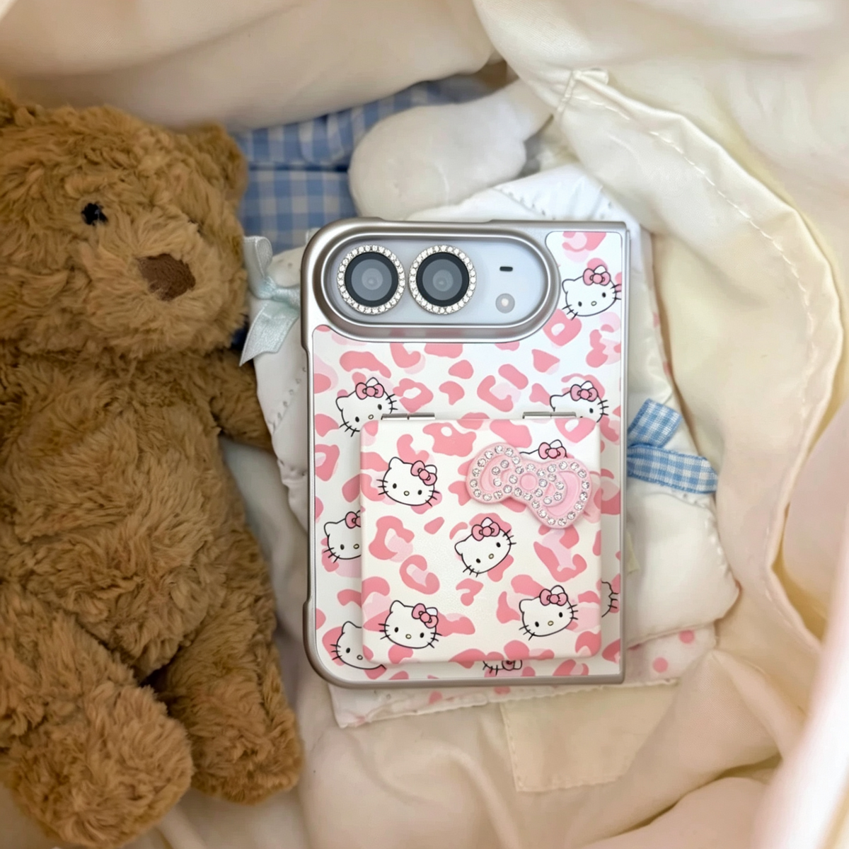 Premium-style foldable phone case featuring a leopard print, rhinestone accents, and a cat-shaped mirror.
