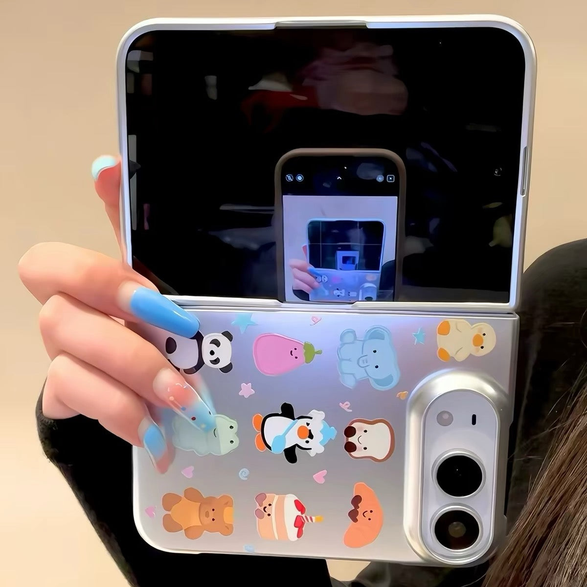 Cute cartoon electroplated silver all-over Jellycat animal print case for iPhone Duo foldable phones.