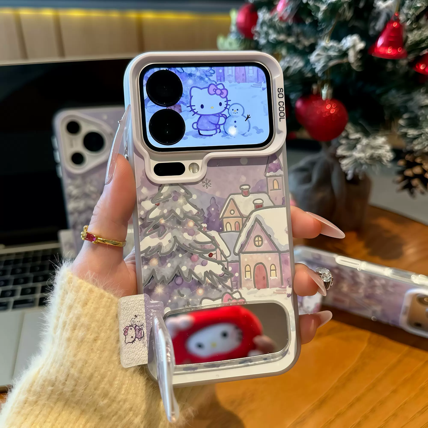 Light purple Christmas tree, snowman, and Hello Kitty phone case